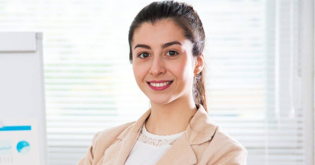 Alnida smiling after skin whitening cream usage