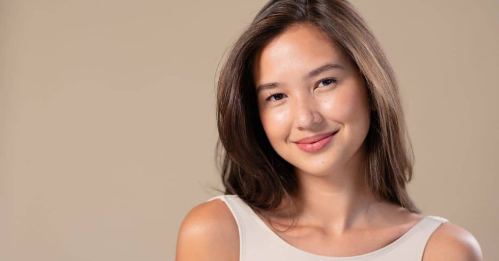 after application of skin whitening cream nori smiling