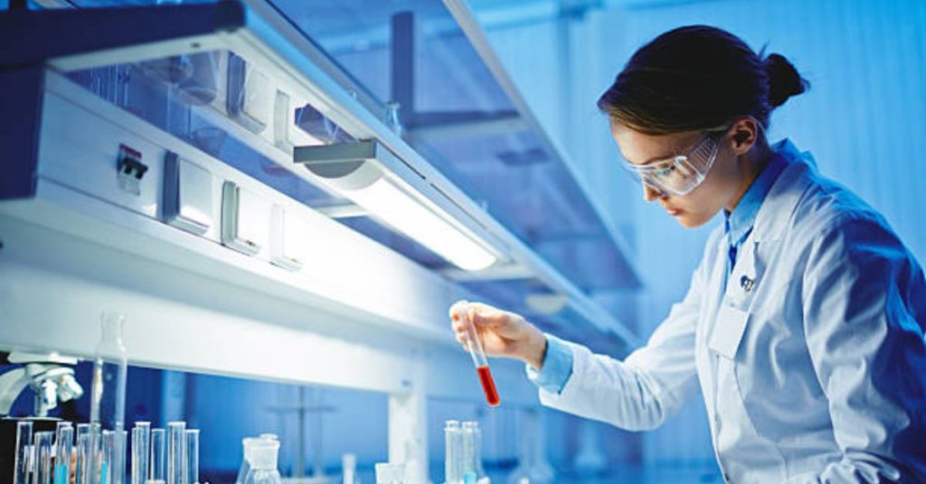 scientist checking whitening cream vs brightening cream for oily skin